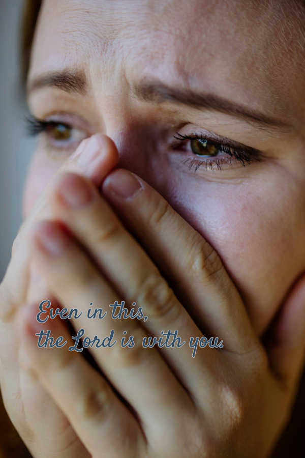 Do you believe that even here, in this dark and hard place, that God can do His work? A person covering her mouth with her hand. Even in this, the Lord is with you.