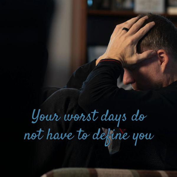 Do you believe that this situation can turn around because God is with you in it? Even on your worst day, God is still with you. a man sits holding his head. Your worst days do not have to define you.